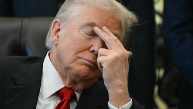 Donald Trump looks tired as he puts fingers to forehead