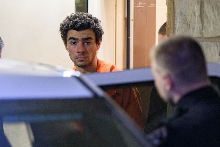 Suspected UnitedHealthcare shooter Luigi Mangione leaves a courthosue