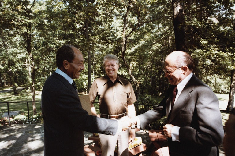 President Jimmy Carter, Egyptian President Anwar Sadat, and Israeli Prime Minister Menachem Begin