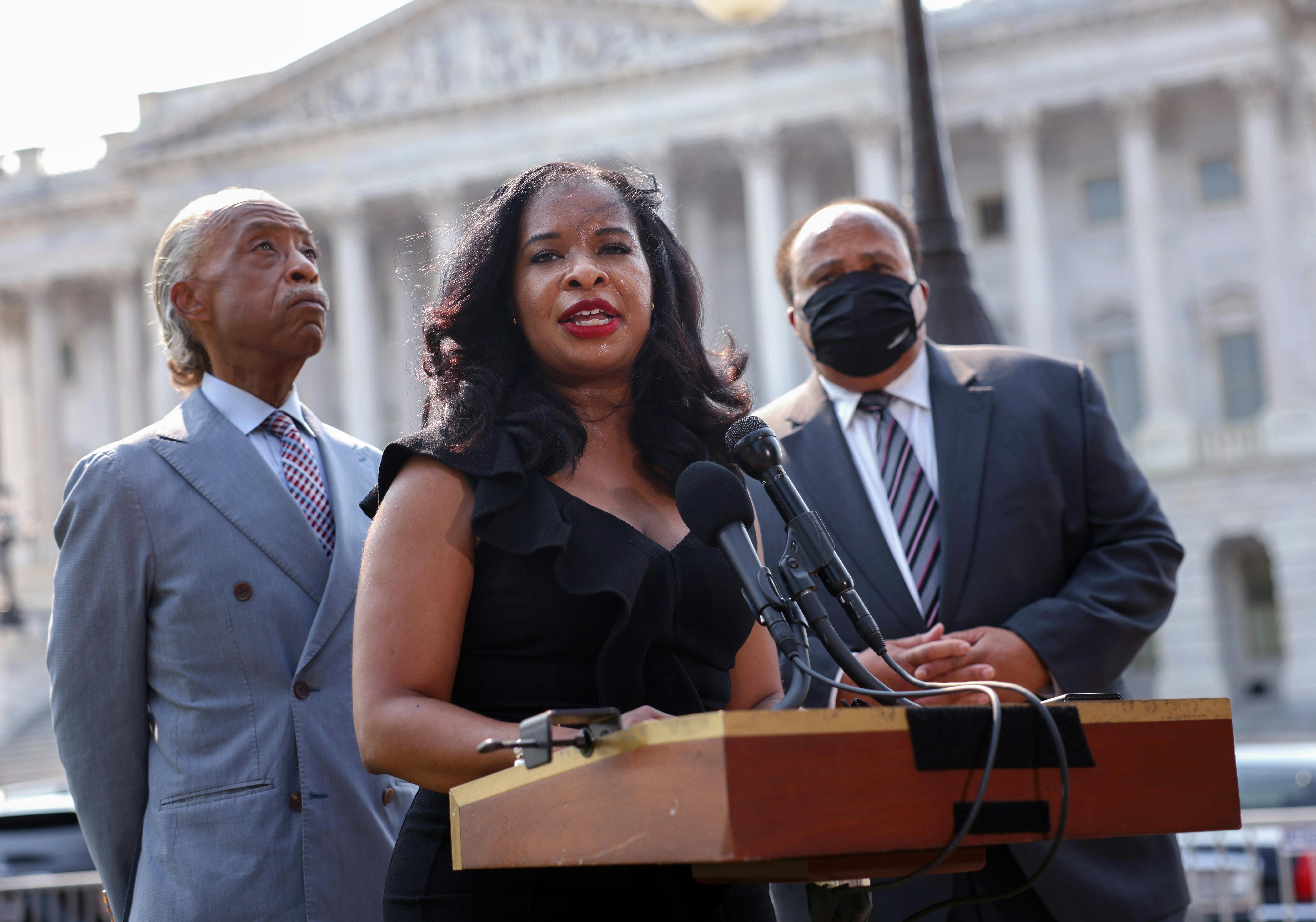 Civil rights leader Arndrea Waters King speaks alongside Rev. Al Sharpton and Martin Luther King III at a press conference on voting rights outside of the U.S. Capitol.