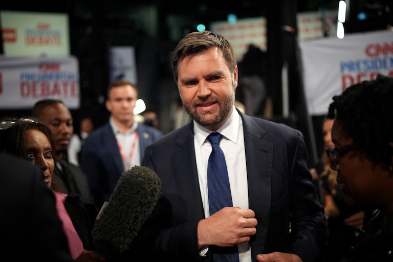 J.D. Vance speaks with reporters