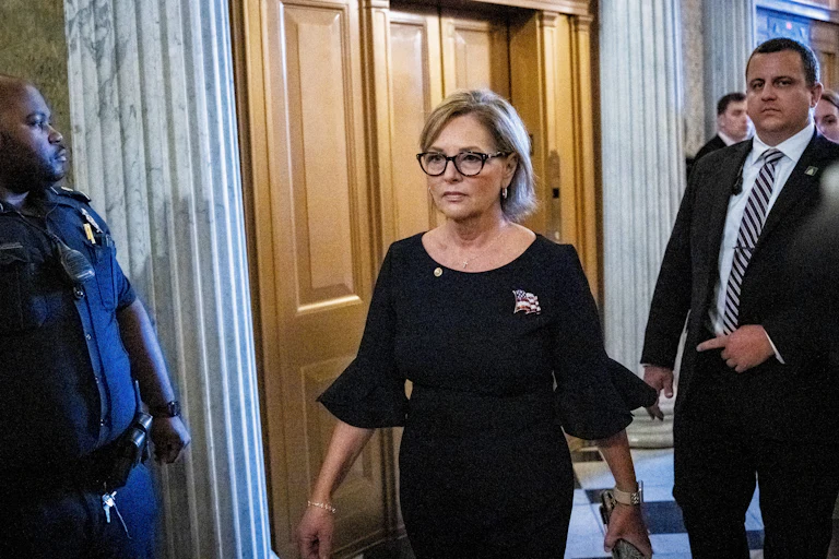 Senator Darline Graham Nordone walks in the Capitol.
