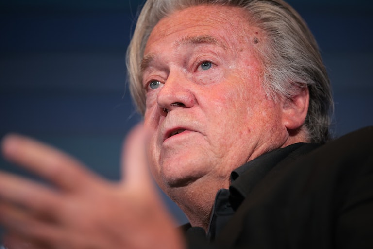 Steven Bannon gestures and speaks