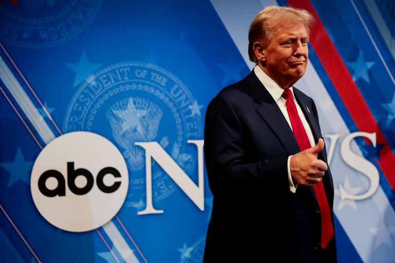 Donald Trump gives a thumbs-up to reporters after the presidential debate