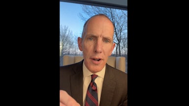 Chris Madel speaking to the camera