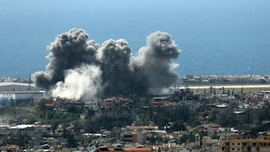 Smoke rise over Beirut after an Israeli strike.