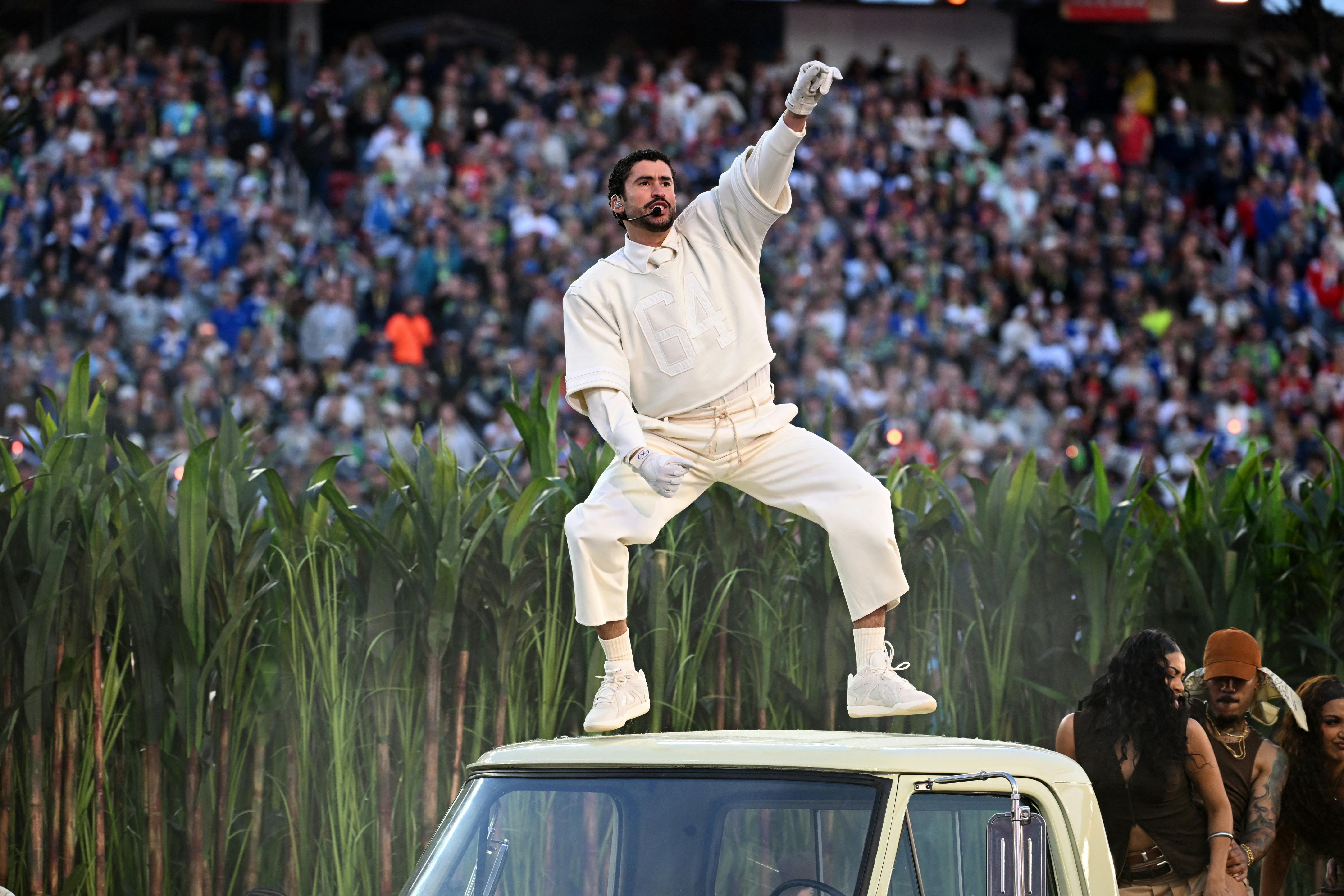 Bad Bunny dances on a car at the Super Bowl Halftime Show.