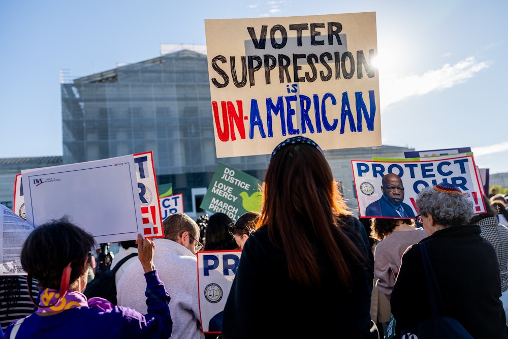 Demonstrators outside the US Supreme Court in Washington, D.C. protest the undercutting of the Voting Rights Act.