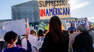 Demonstrators outside the US Supreme Court in Washington, D.C. protest the undercutting of the Voting Rights Act.