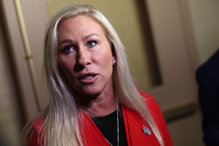 Marjorie Taylor Greene speaks and looks off camera