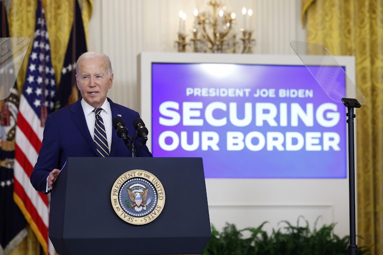 Joe Biden speaks at a podium
