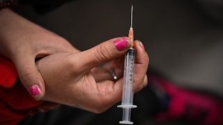 A drug user inside a "Safe Consumption" van