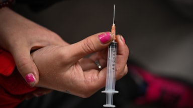 A drug user inside a "Safe Consumption" van