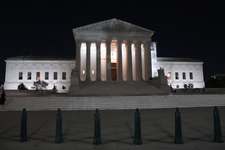 The Supreme Court building at night