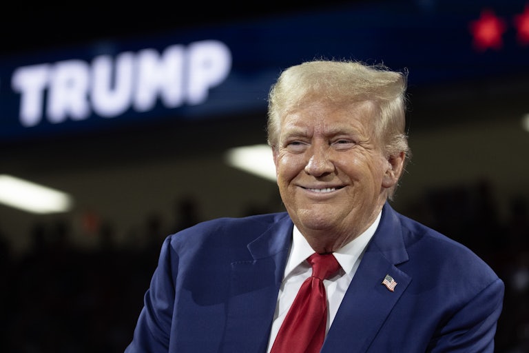 Donald Trump smiles during a campaign event
