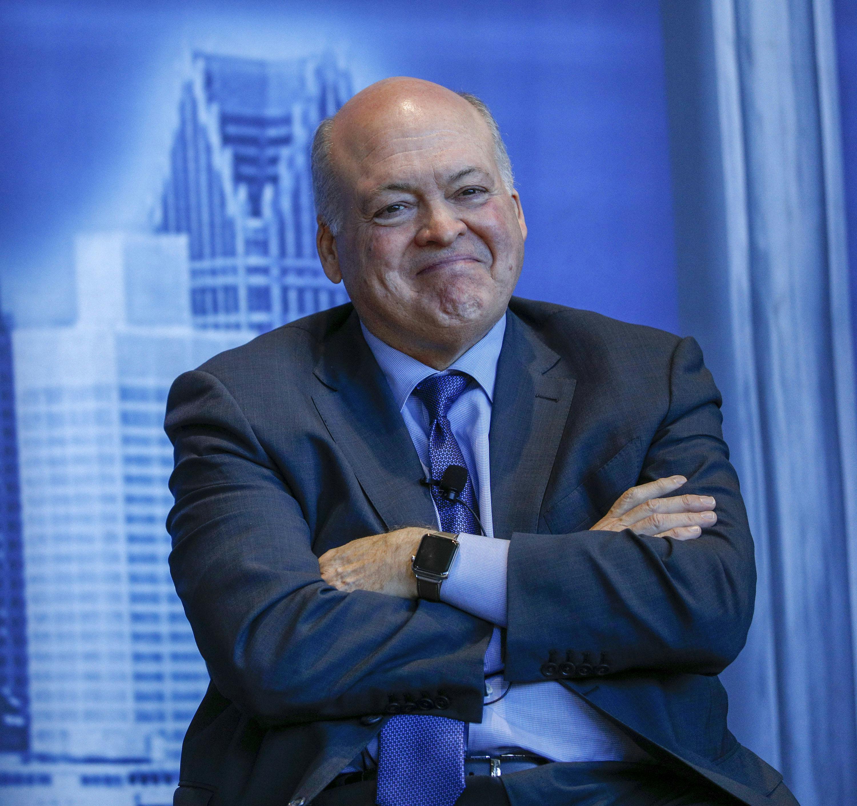 Former Ford CEO Jim Hackett sports a smile in 2019.
