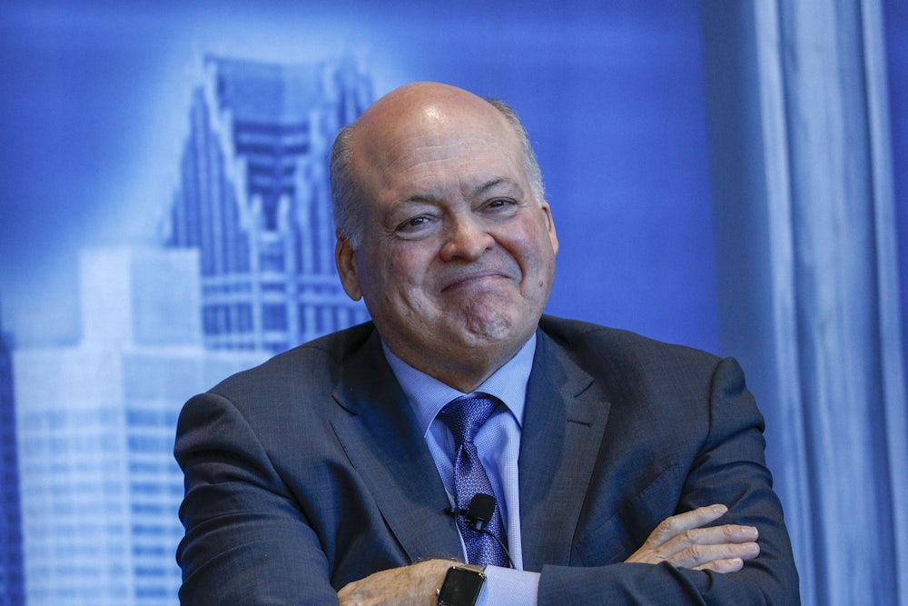 Former Ford CEO Jim Hackett sports a smile in 2019.