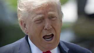 Donald Trump speaks vehemently with open mouth