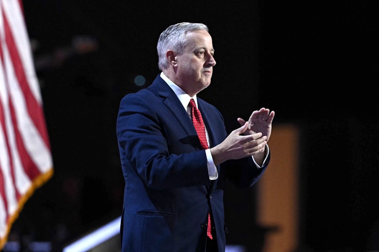 RNC Co-Chair Michael Whatley claps during the Republican National Convention