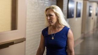 Representative Marjorie Taylor Greene walks in the Capitol