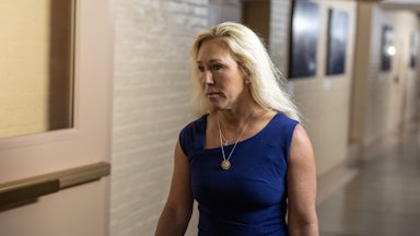 Representative Marjorie Taylor Greene walks in the Capitol
