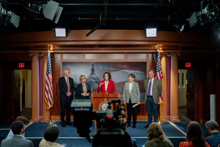Senators Angus King, Maggie Hassan, Catherine Cortez Masto, Jeanne Shaheen, and Tim Kaine hold a news conference on the Capitol.