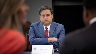 Ron Klain takes a deep breath at a meeting in D.C.