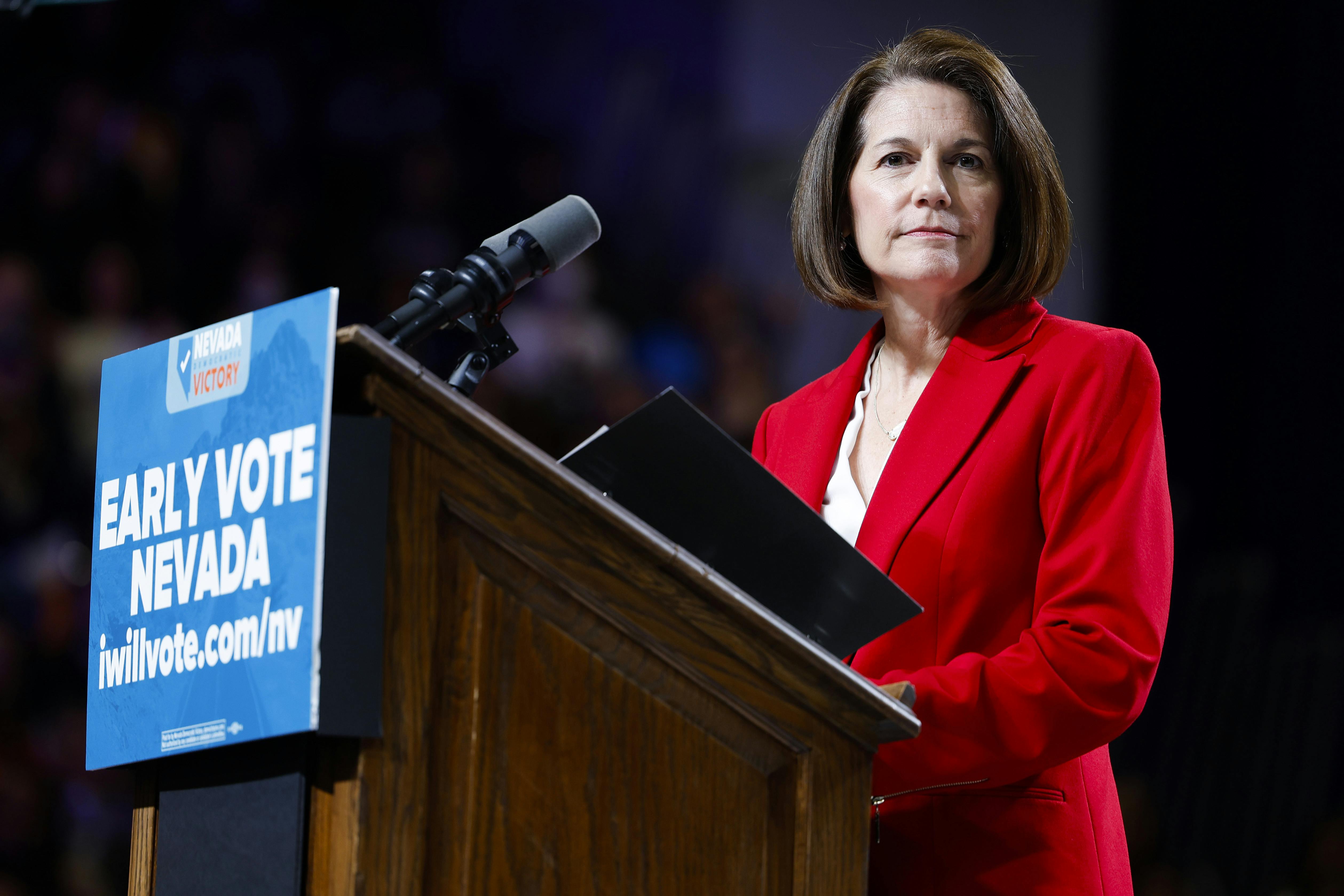 Senator Catherine Cortez Masto speaks at a podium.