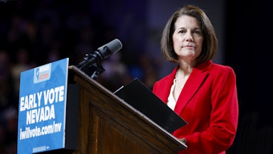 Senator Catherine Cortez Masto speaks at a podium.