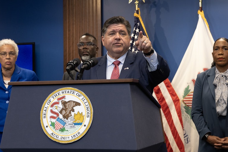 JB Pritzker holds a press conference with Chicago Mayor Brandon Johnson and other political leaders.