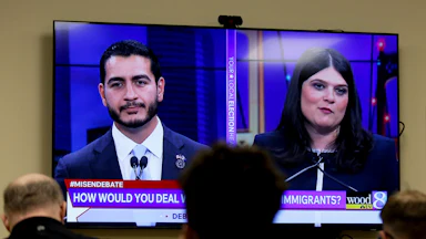Michigan U.S. Senate candidates Abdul El-Sayed and Rep. Haley Stevens during a debate on Tuesday night