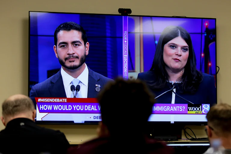 Michigan U.S. Senate candidates Abdul El-Sayed and Rep. Haley Stevens during a debate on Tuesday night