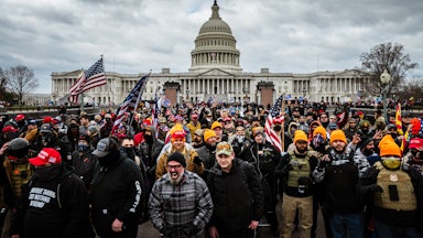 An angry crowd gathers outside the U.S. Capitol on January 6, 2021.