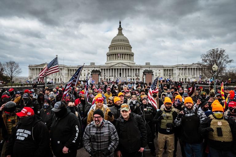 An angry crowd gathers outside the U.S. Capitol on January 6, 2021.