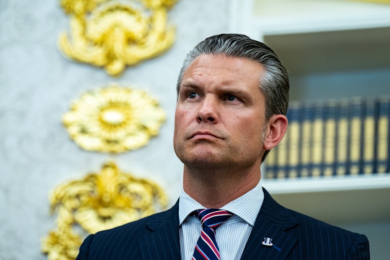 Defense Secretary Pete Hegseth attends a press conference.