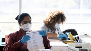 Election workers in Atlanta count ballots from Fulton County