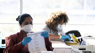 Election workers in Atlanta count ballots from Fulton County