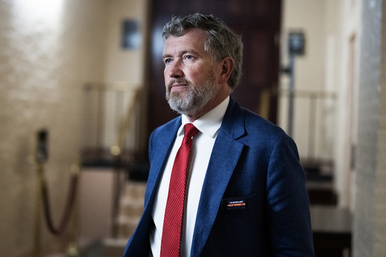 Representative Thomas Massie walks in the Capitol