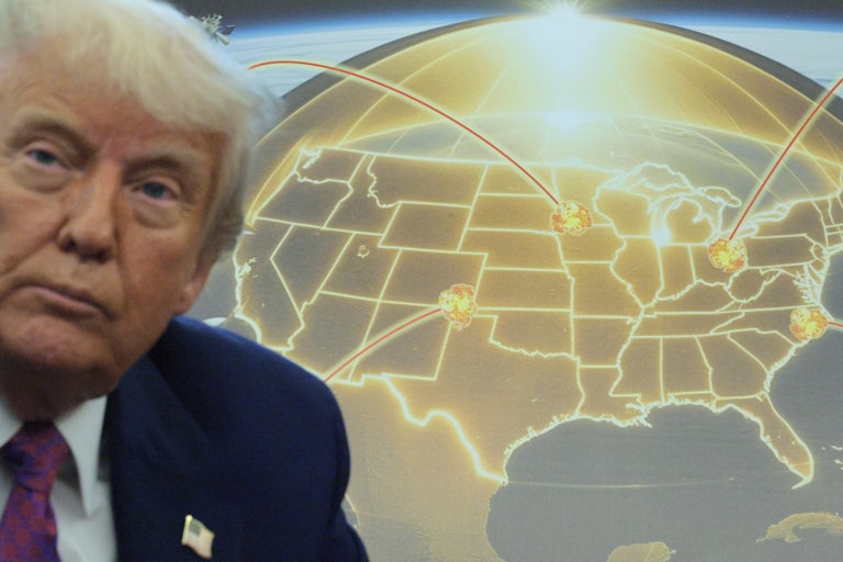 Donald Trump sits in front of an illustration of his Golden Dome project in the Oval Office