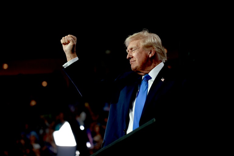 Donald Trump raises his fist at the Republican National Convention