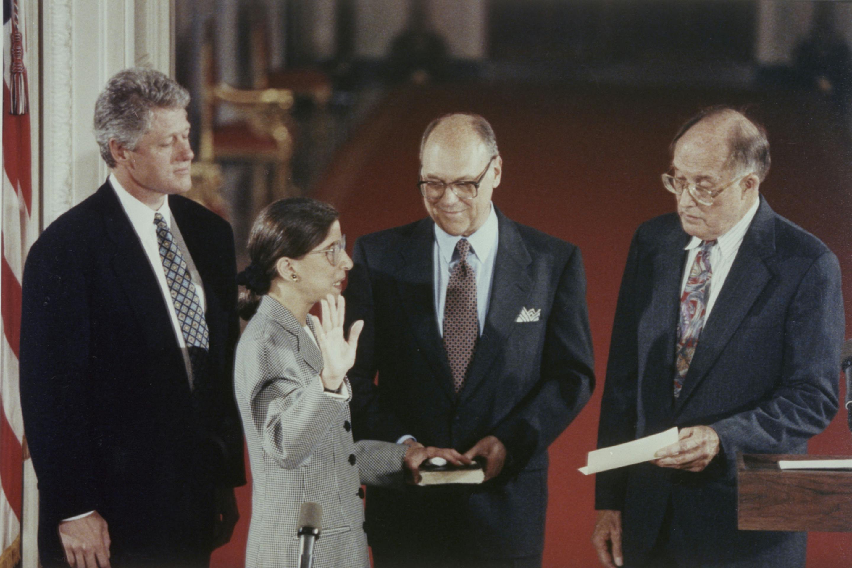 Ruth Bader Ginsburg at her 1993 swearing-in, with (left to right) Bill Clinton; her husband, Martin; and William Rehnquist.