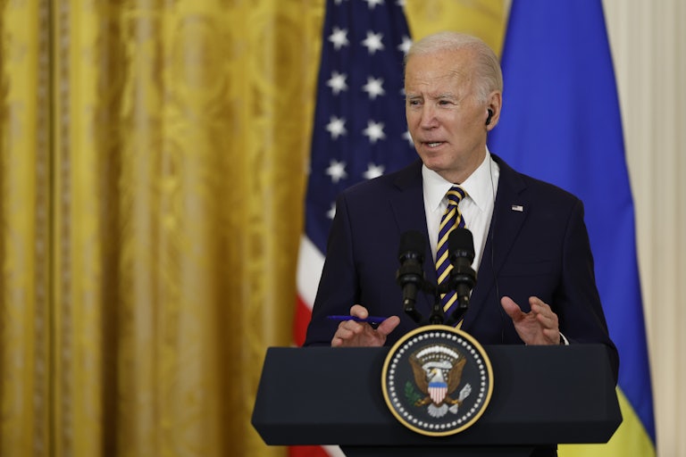 President Joe Biden speaks at a podium