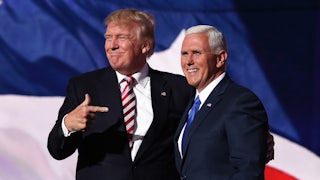 Donald Trump stands with Mike Pence in happier times.