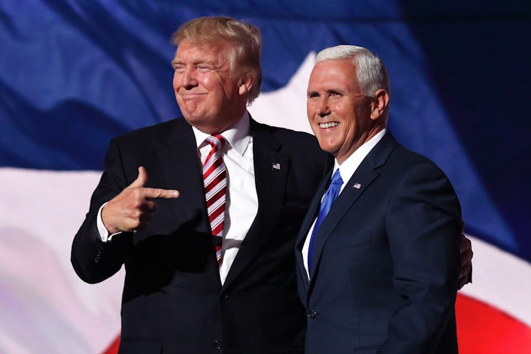 Donald Trump stands with Mike Pence in happier times.