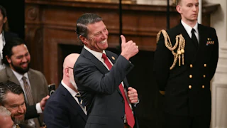 Representative Ronny Jackson gives a thumbs up and smiles