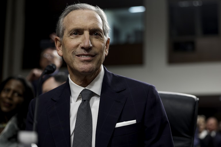 Former Starbucks CEO Howard Schultz smiles