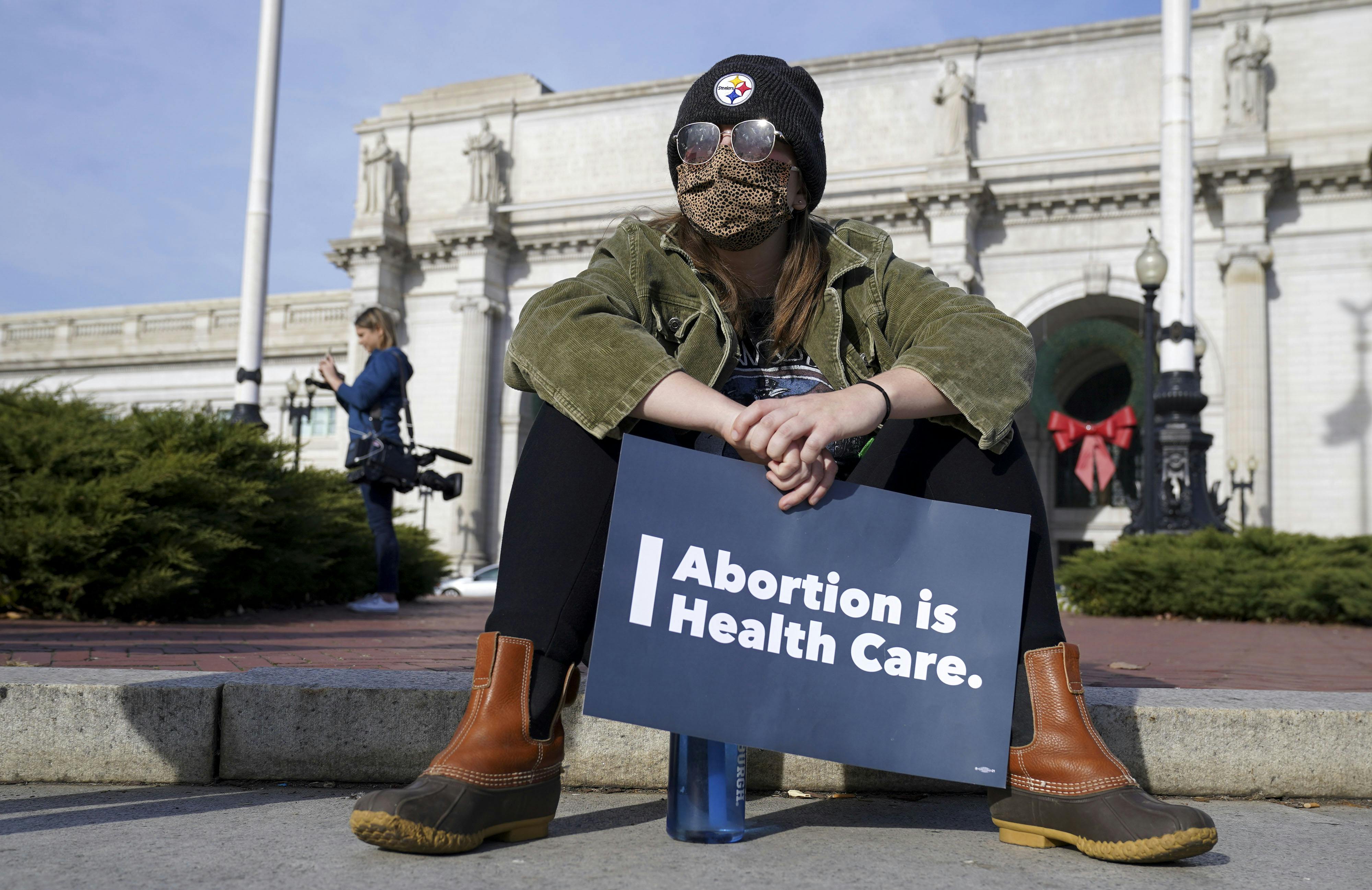 A participant holds a sign during the Women's March "Hold The Line For Abortion Justice" at Union Station on December 01, 2021 in Washington, DC