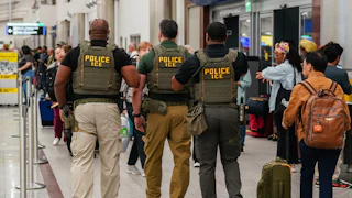 Three ICE agents in ATL airport.