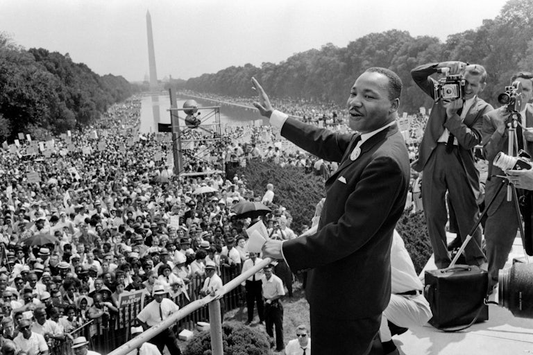 Martin Luther King Jr. waves after giving his “I Have a Dream” speech