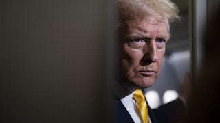 Donald Trump glowers aboard Air Force One